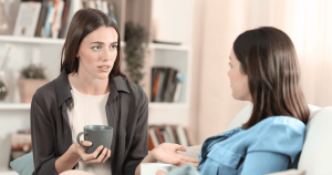 Woman in therapy session silently asking am I doing therapy right while appearing composed and regulated